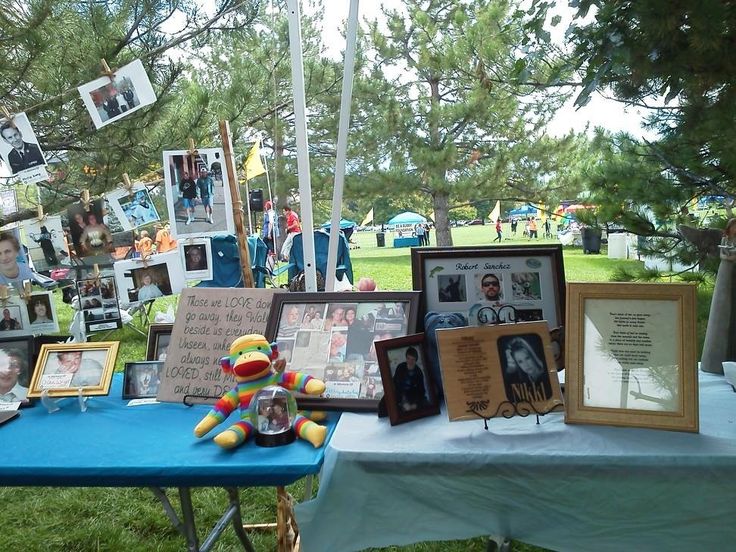 Table with photos and memories - Suicide Facts, Warning Signs and Risk Factors